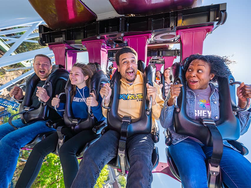 two adults and two teens on great bear hersheypark