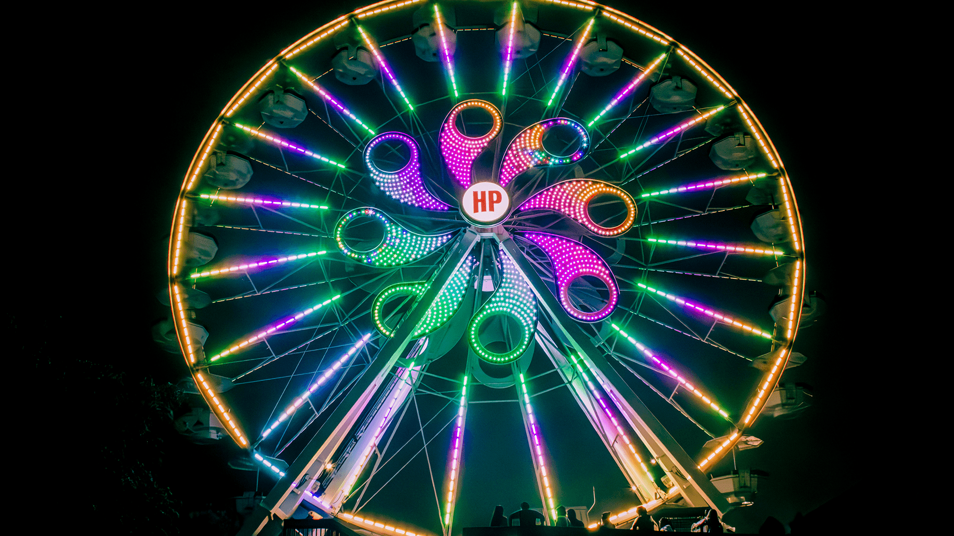 ferris wheel lit up at night