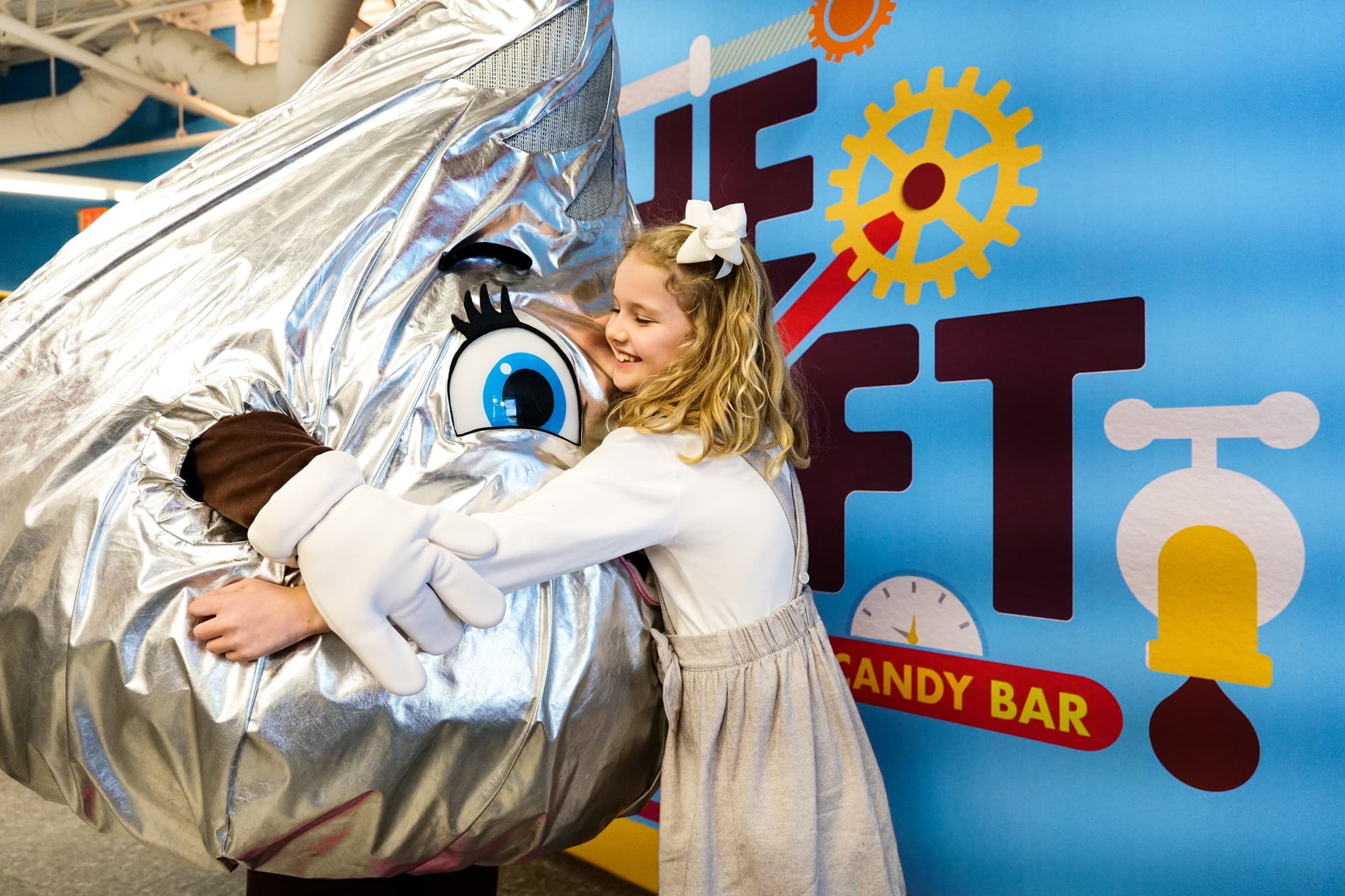 girl hugging miss kiss character